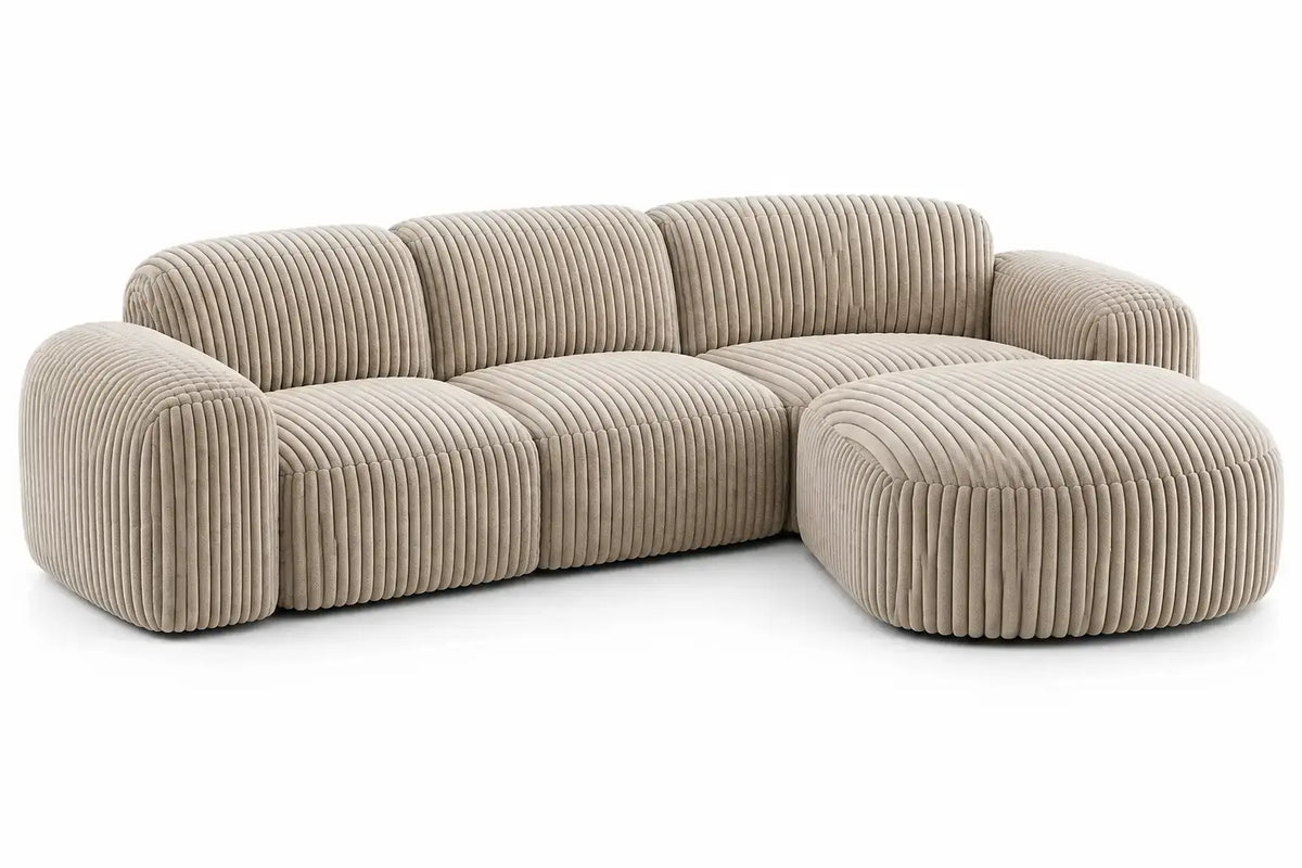 Beige ribbed upholstered sofa from RidgeandRung, featuring plush cushions and modern design in a living room setting.