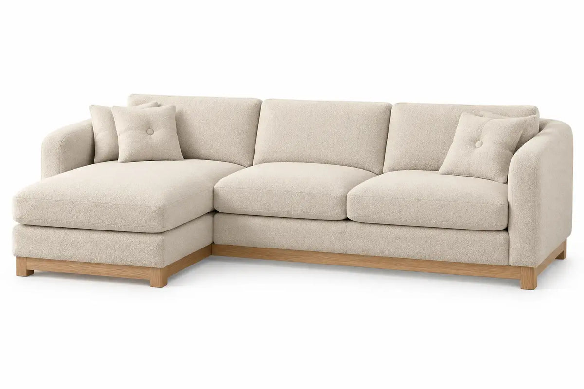 Beige L-shaped sofa with padded seat and backrest from RidgeAndRung, showcasing comfortable cushioning and modern design.